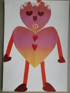 na zdjęciu ludzik wykonany z serc